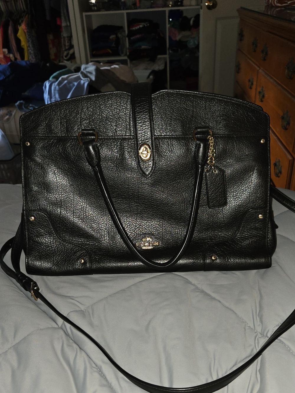 classic black grain leather Coach Mercer 30 satchel, accented with polished gold